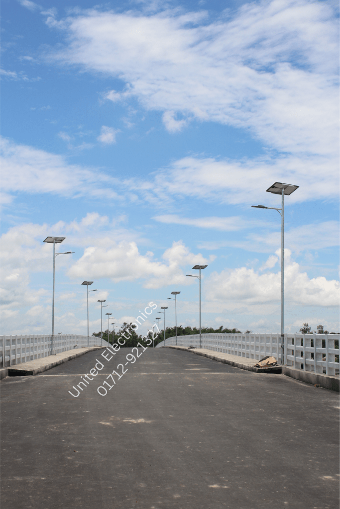 Solar street lights installed along both sides of a bridge