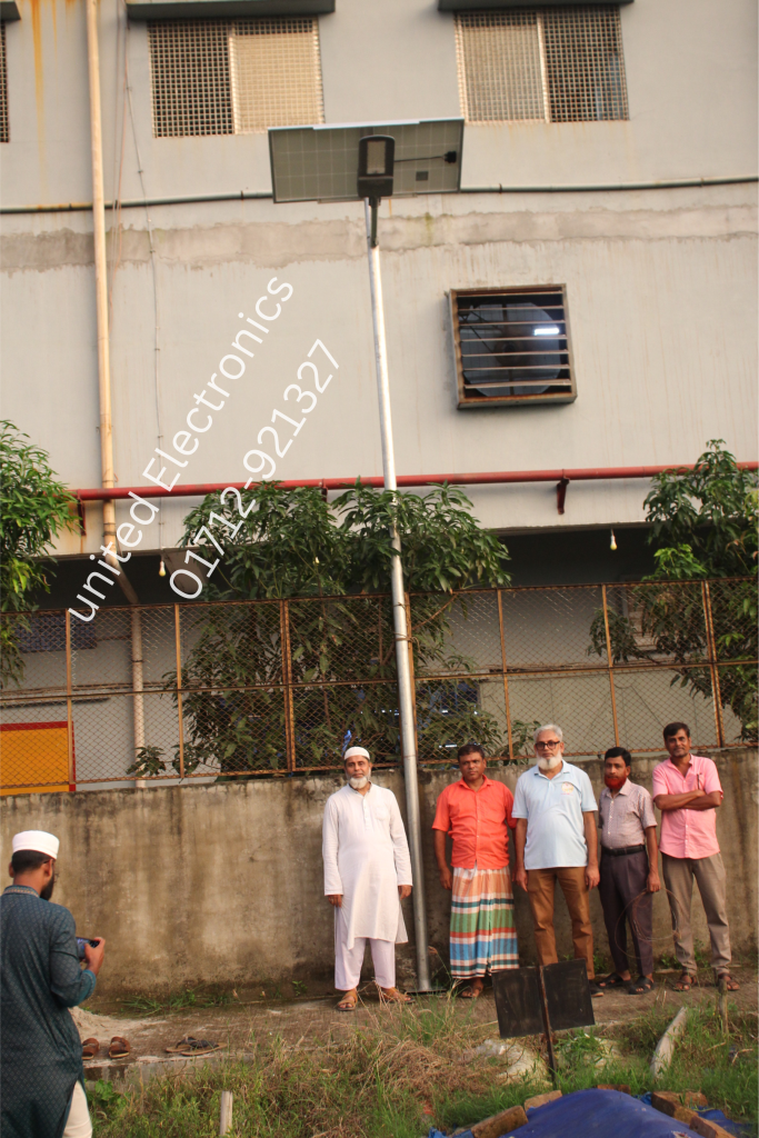 Solar street light installed outside a building
